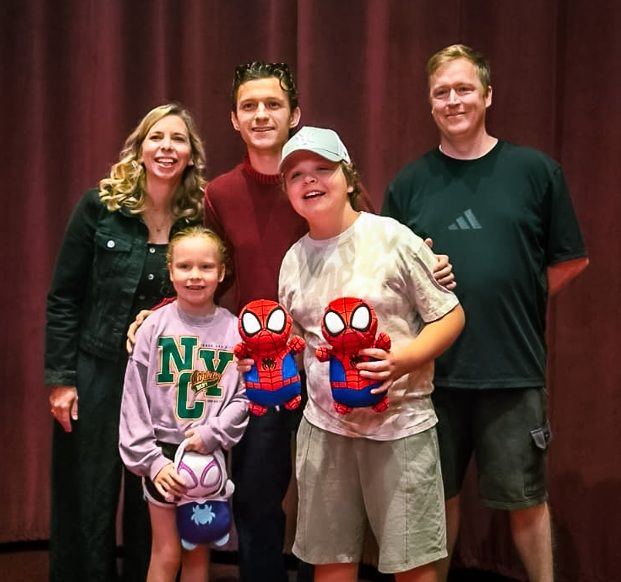 A Momentum-supported family with Tom Holland at the Spiderman screening