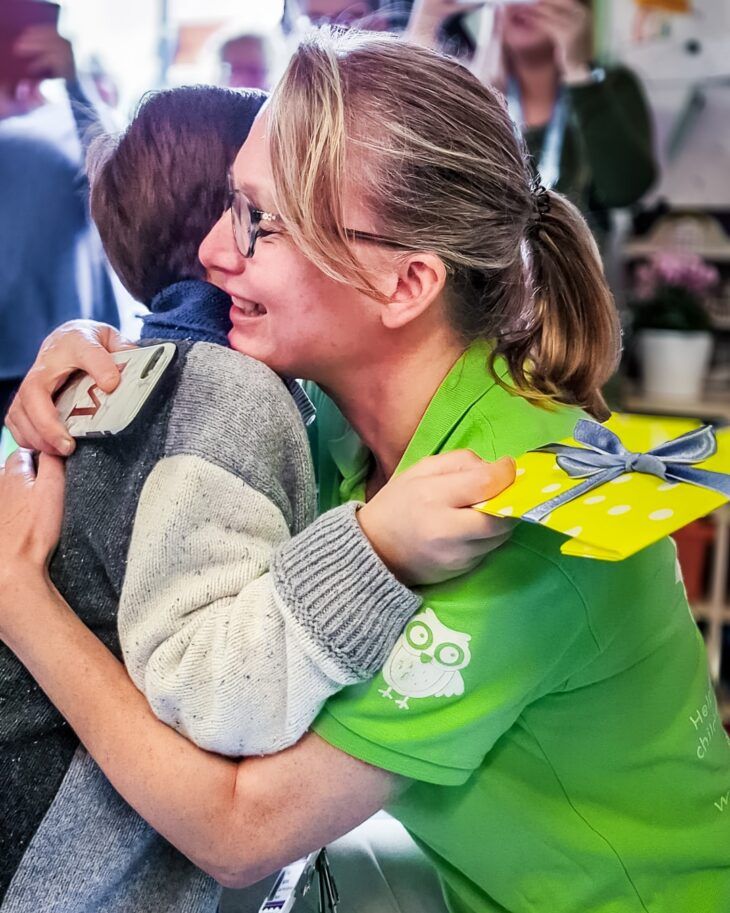 A Momentum Family Support Worker with a family