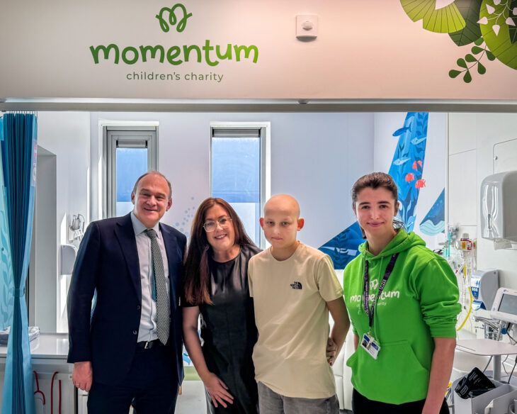 Sir Ed Davey with a Momentum supported family at Kingston Hospital