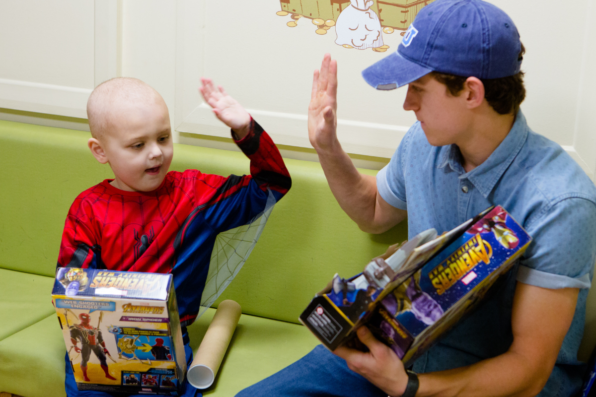 Charity ambassador and Spider-man visits hometown children's ward -  Momentum Children's Charity